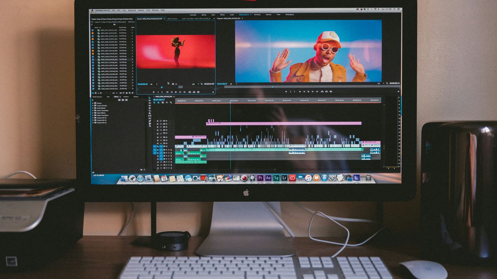 An edit suite with a monitor showing a running timeline